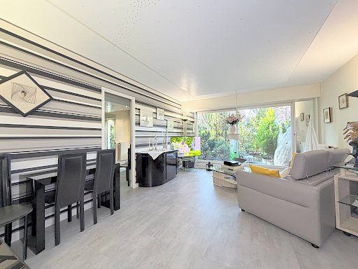 4 pièces traversant, jardin 26 m2 , DPE C, cave et parking